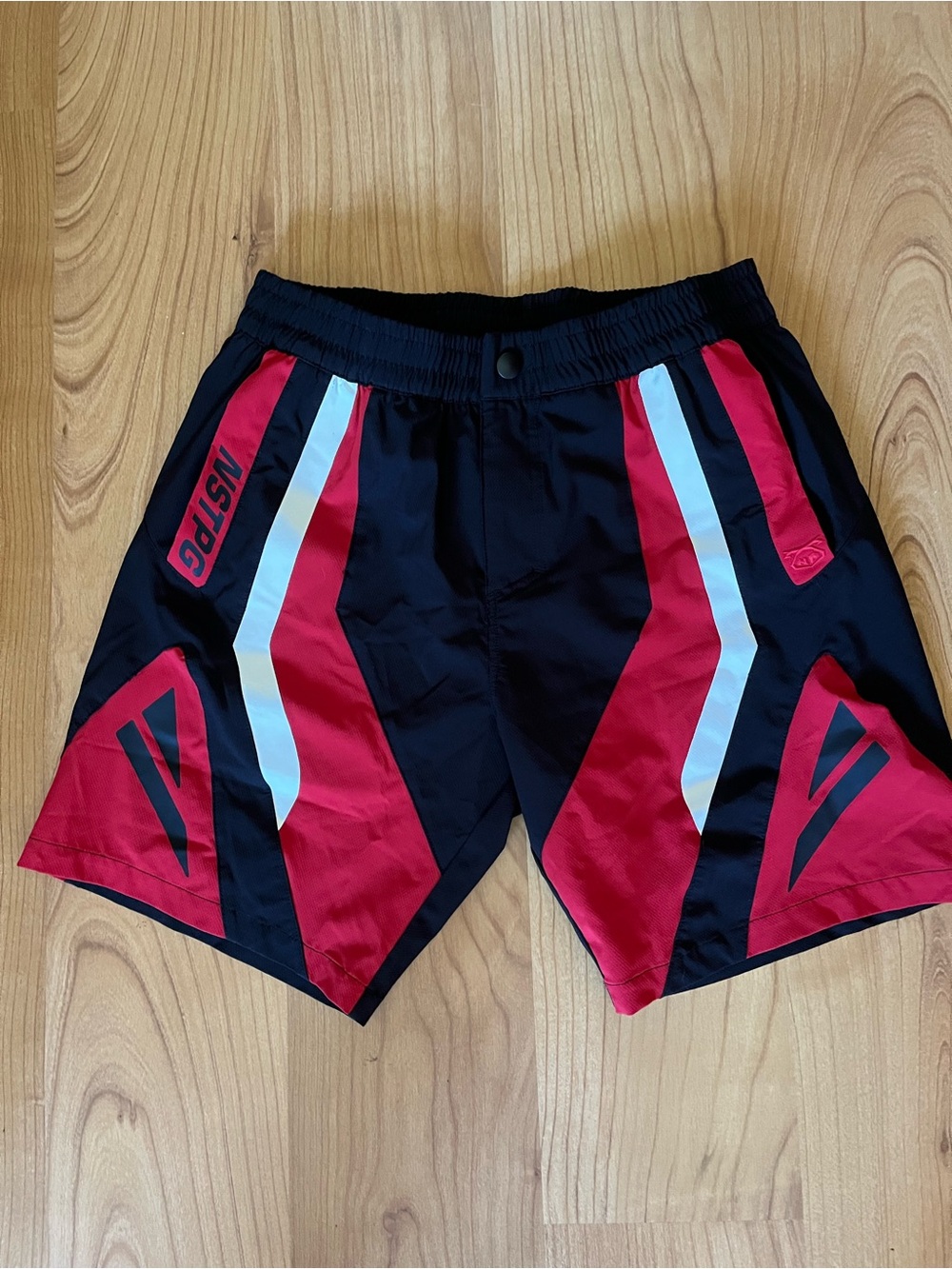Nasty Pig Red & Black Athletic Shorts with Graphic Panels